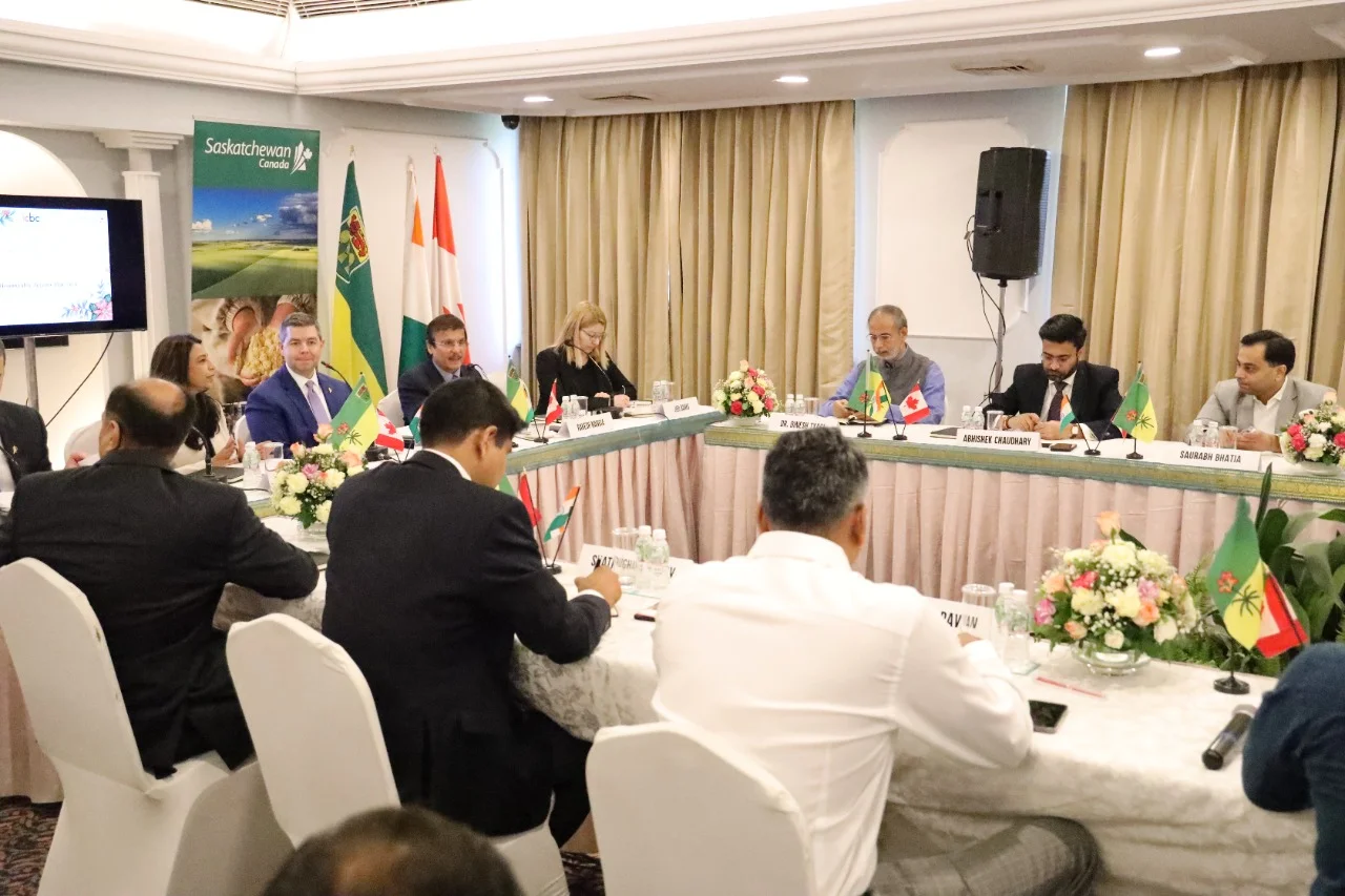 Boardroom table with directors reviewing company documents